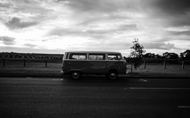 a short van parked in a parking lot