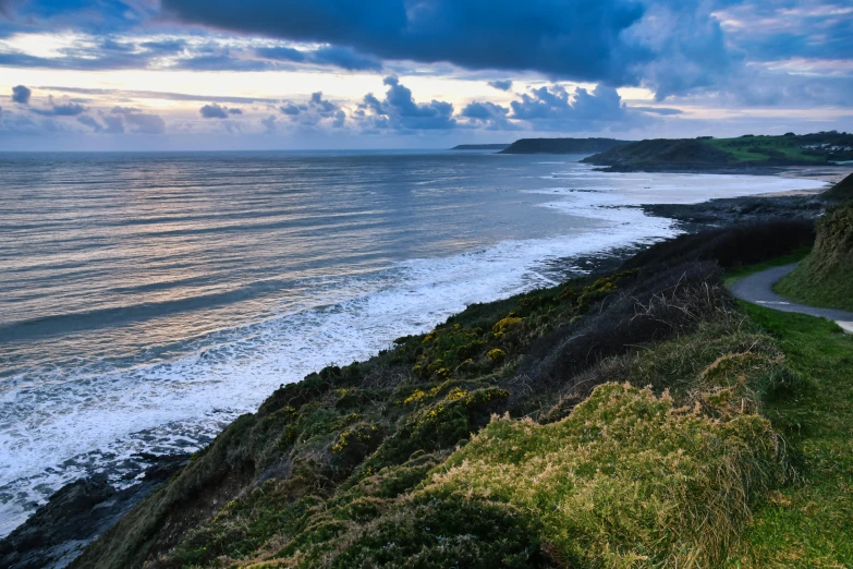 the coast line at sunset is almost empty