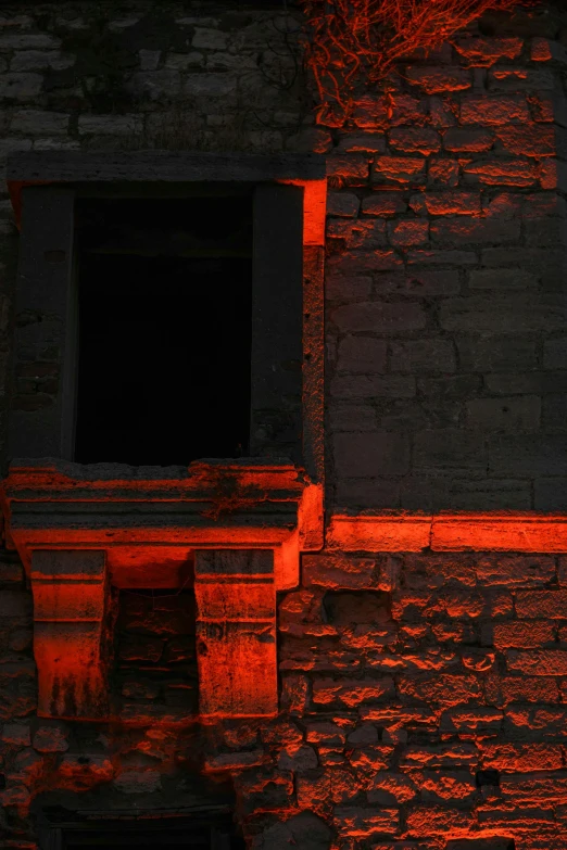 an image of a wall that has red light on it