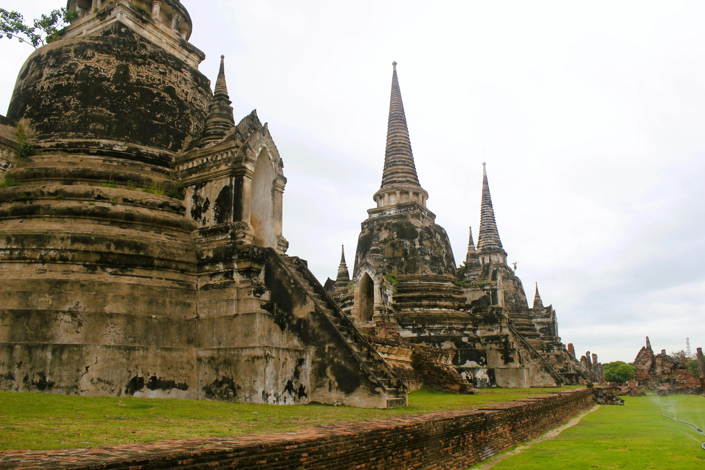 an old building that has spires in it