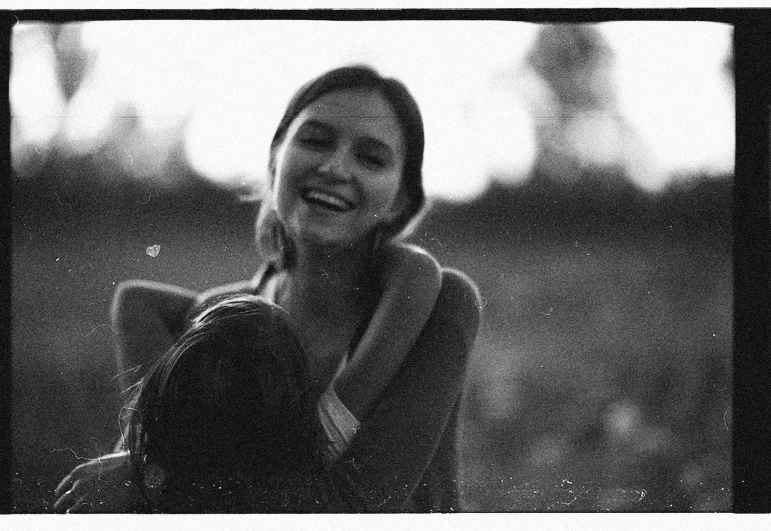 black and white image of a woman smiling