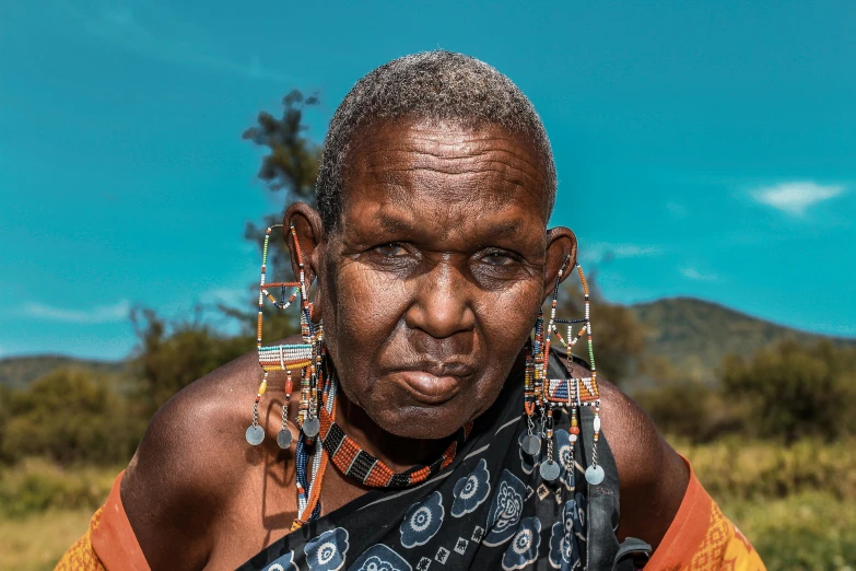 this is an image of a woman wearing earrings