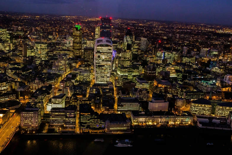 an aerial view of the city of london at night