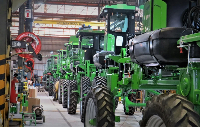 the large machines are being worked on by the workers