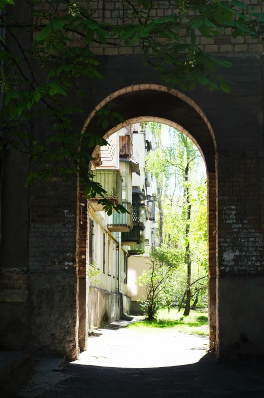 a long walkway with a bridge above it