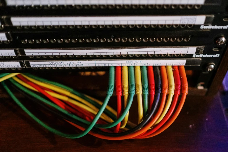 colorful cords connected to a rack in the same area