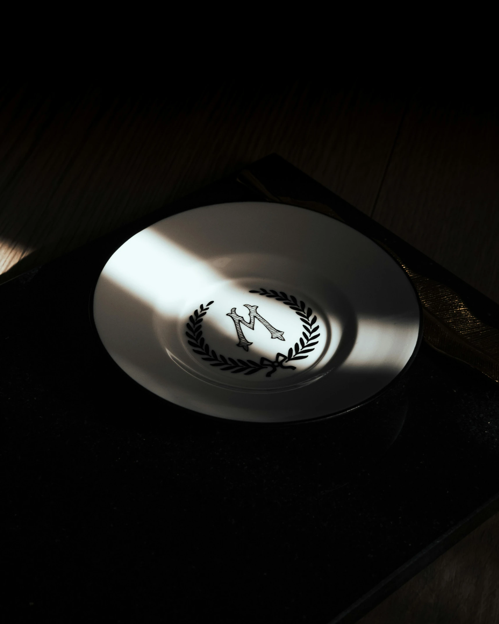 a bowl sitting on top of a black table