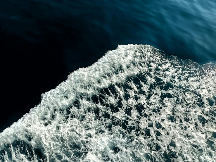 a view of the water from above on a boat