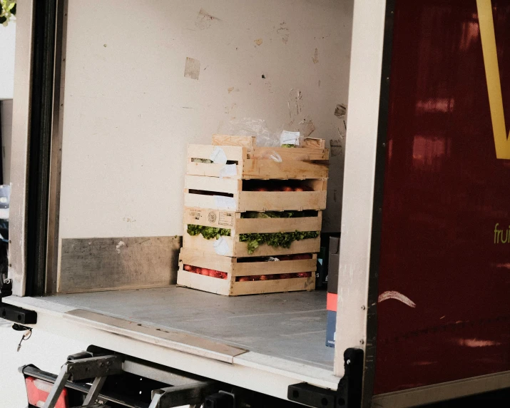 the back of a truck with boxes attached to it