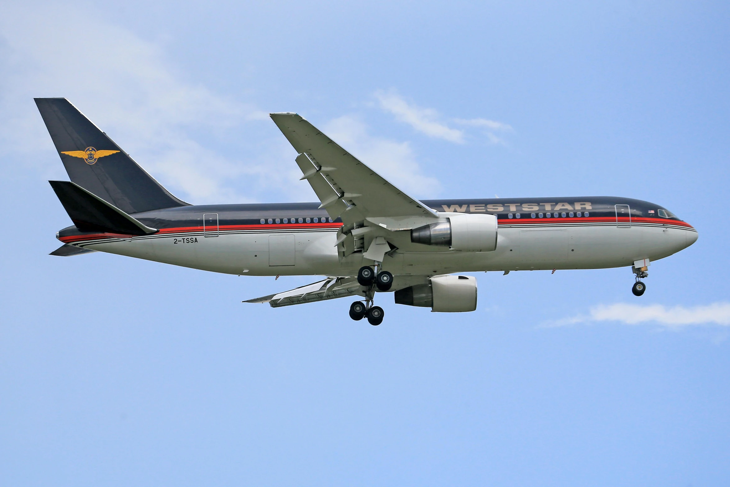 a large passenger airplane flying in the air