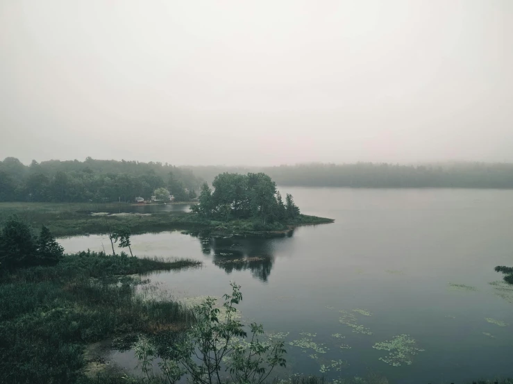 the lake and islands on a foggy day