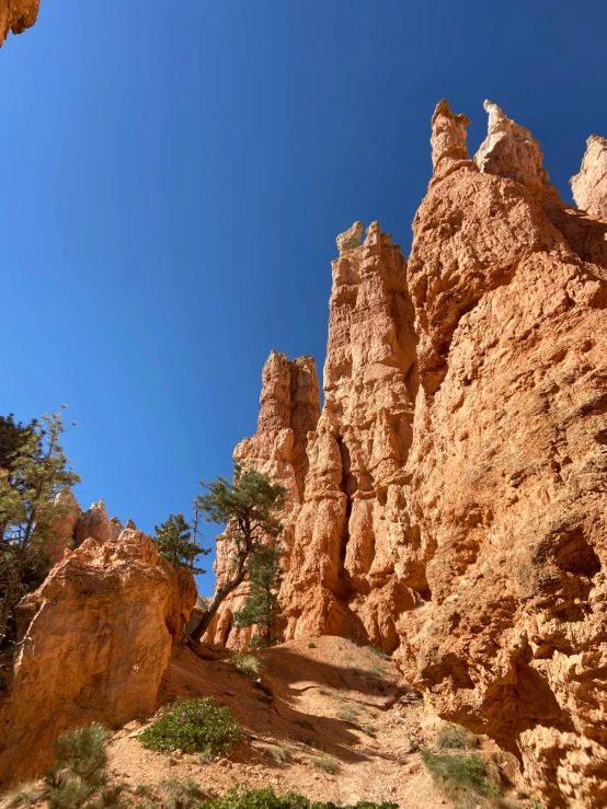 the trail is carved between rocks and boulders