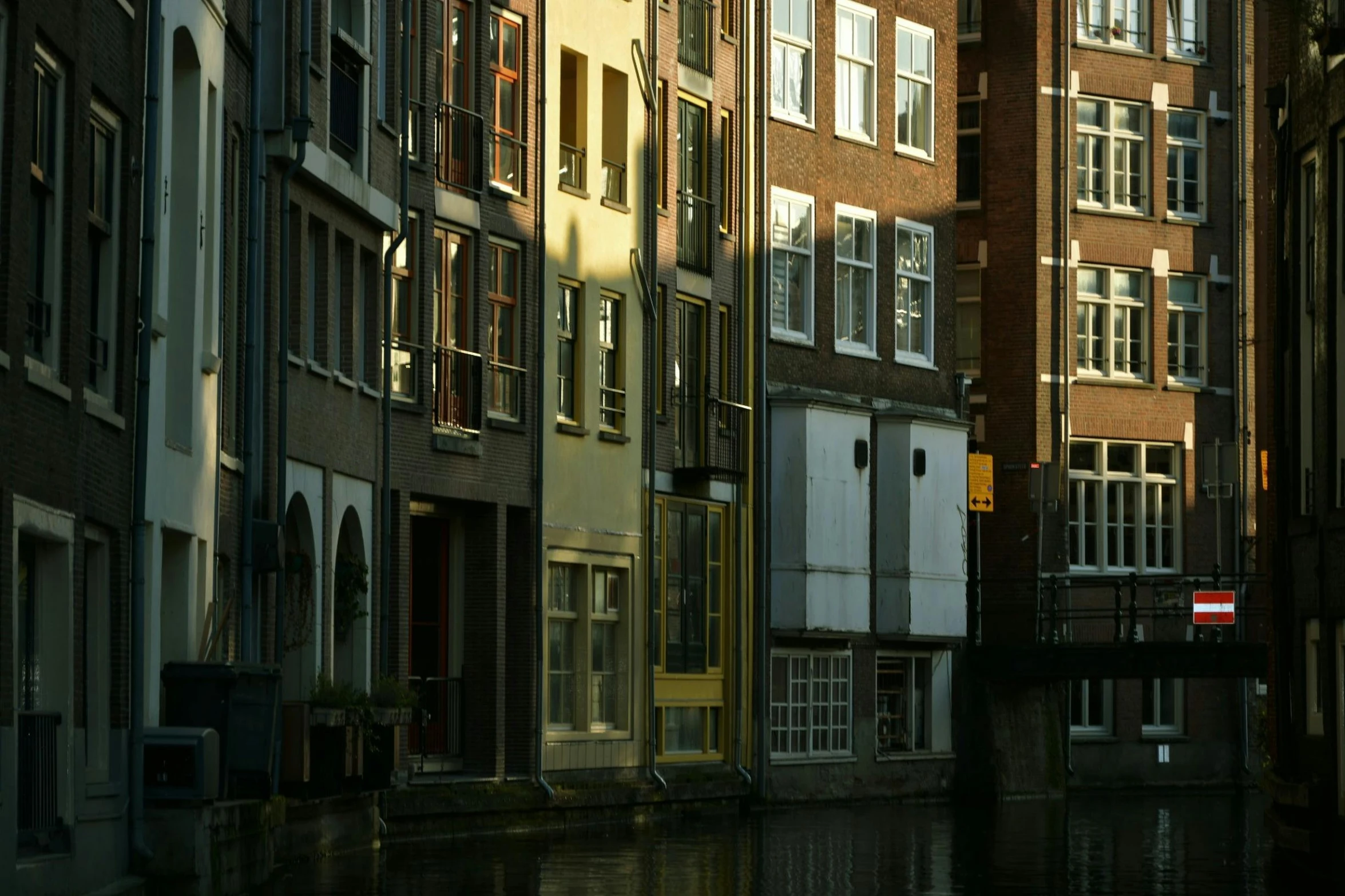 there are many old buildings along a waterway