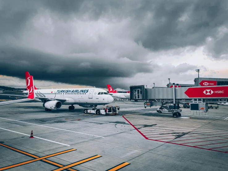 the plane is preparing to be boarded at the airport