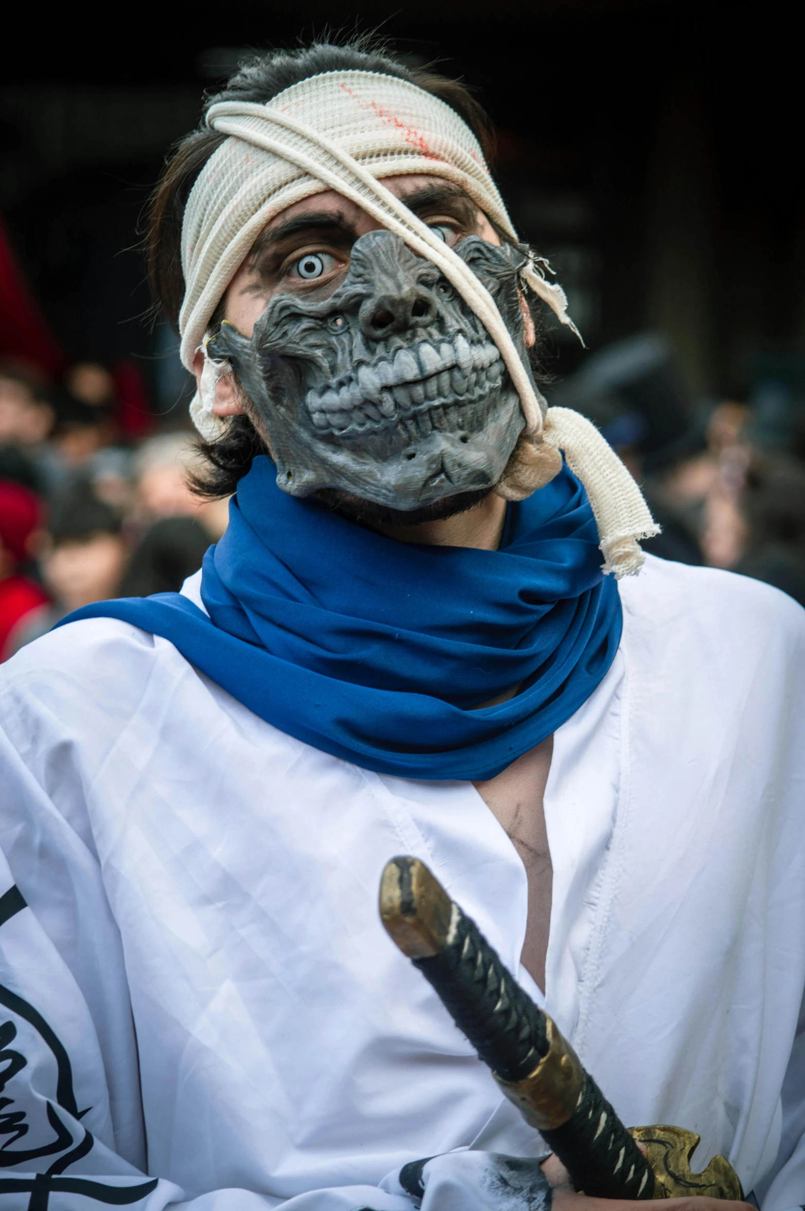 a person dressed up in halloween costumes with a fake skull on top