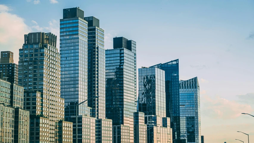 a po of a bunch of tall buildings on a street corner