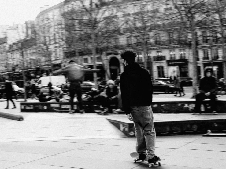 the skateboarder is waiting to do his trick