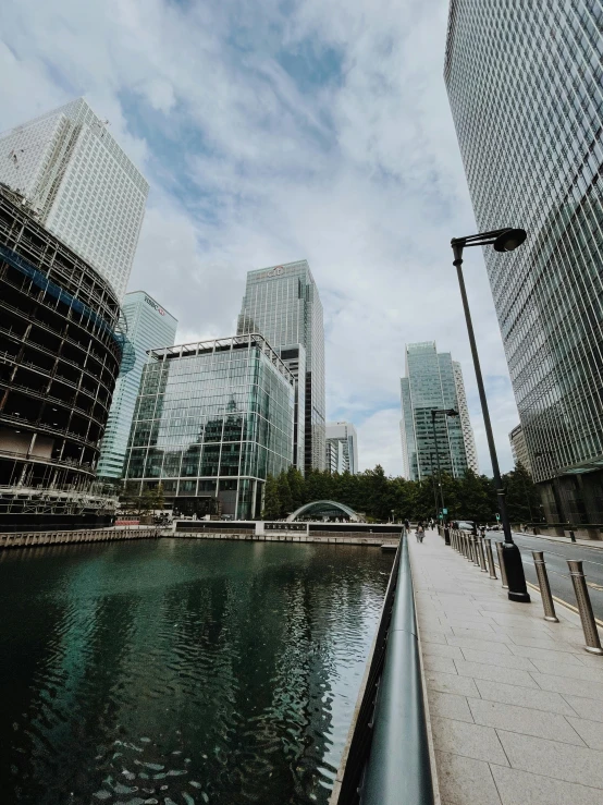 view from the outside along a waterway surrounded by tall buildings