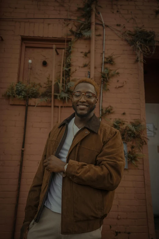 a man is standing outside on the street