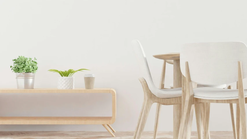 a table and three chairs in a room