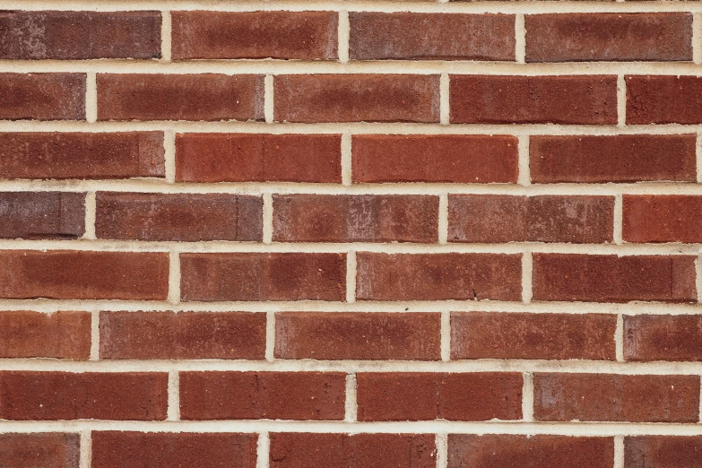 a red brick wall with no mortar or mortaring