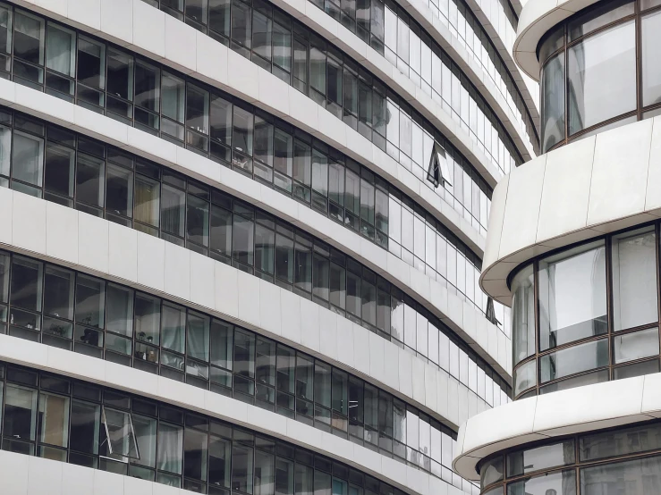 a tall building with several windows next to each other