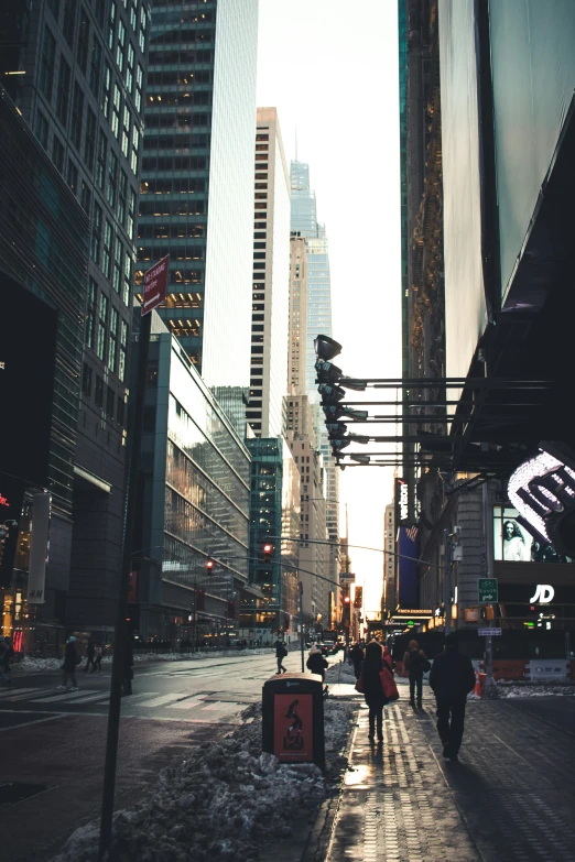 a couple of people are walking in the city