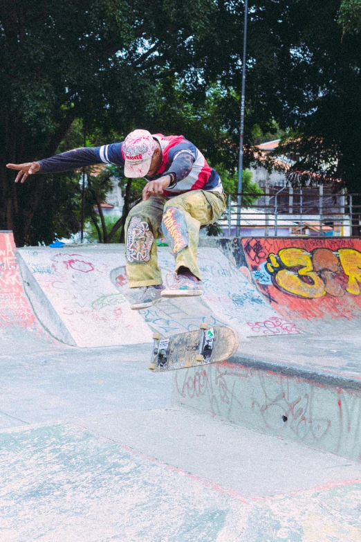 a man on a skate board at a skate park