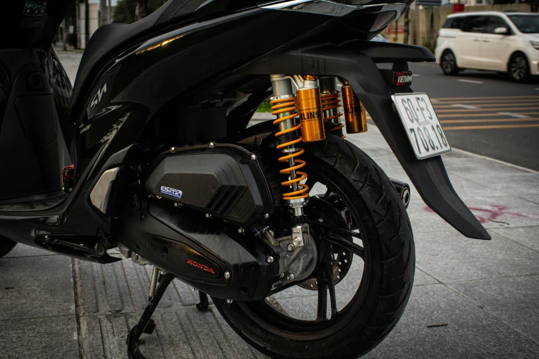 a motorcycle is parked on the side of a road