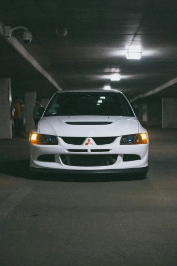 a car parked inside an underground parking lot