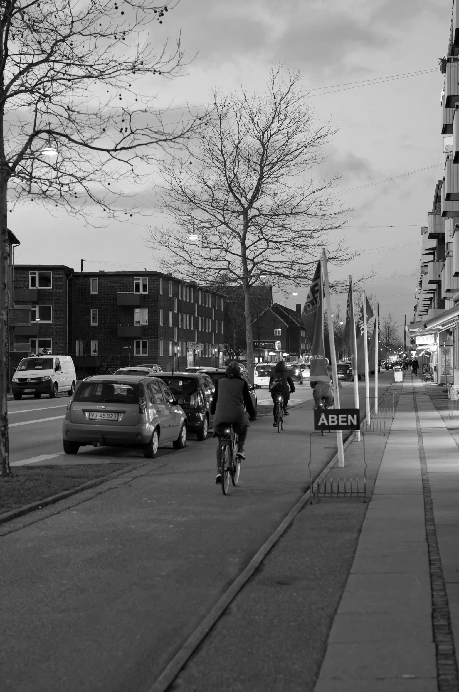 a person is riding a bike down the street