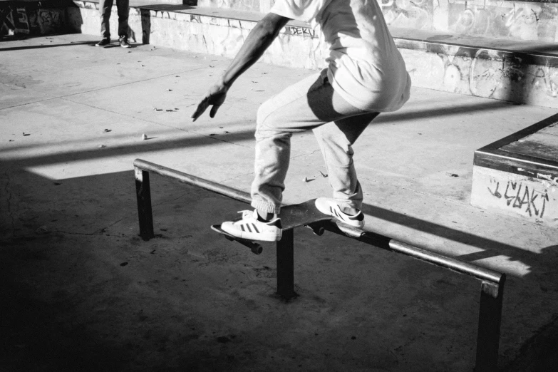 a boy rides on the back of a skateboard