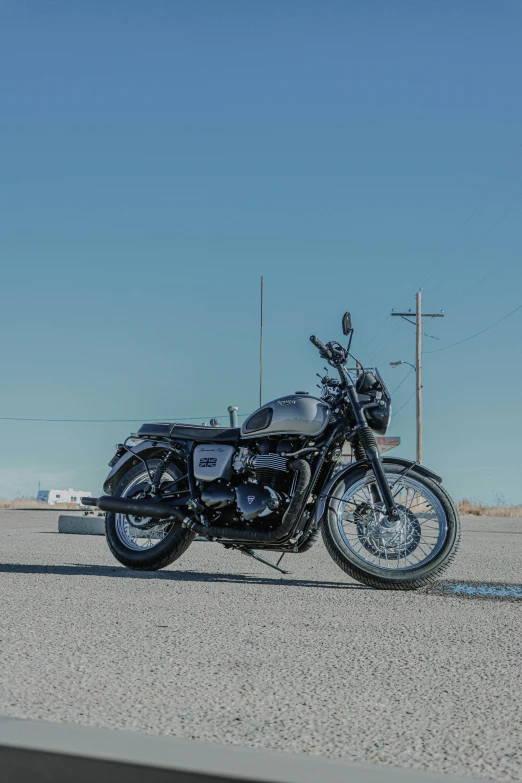 the motorcycle is parked in the parking lot