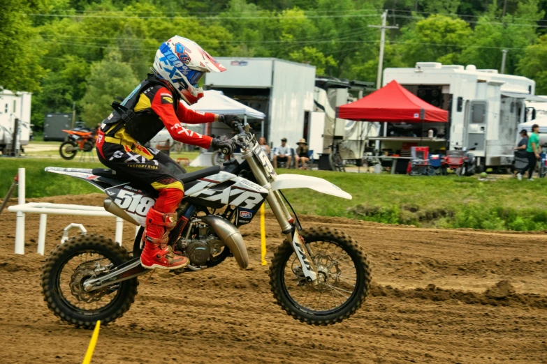 a person is riding on a dirt bike