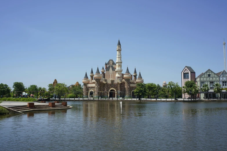 a lake sits in front of the building