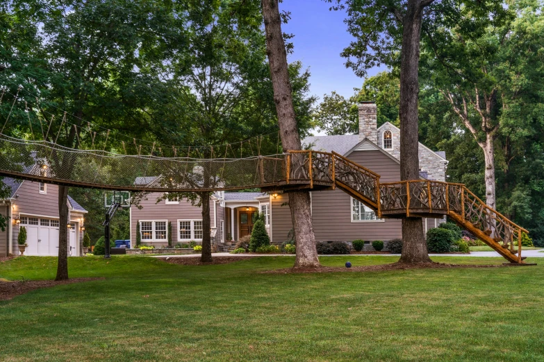 a home with a slide in the front yard