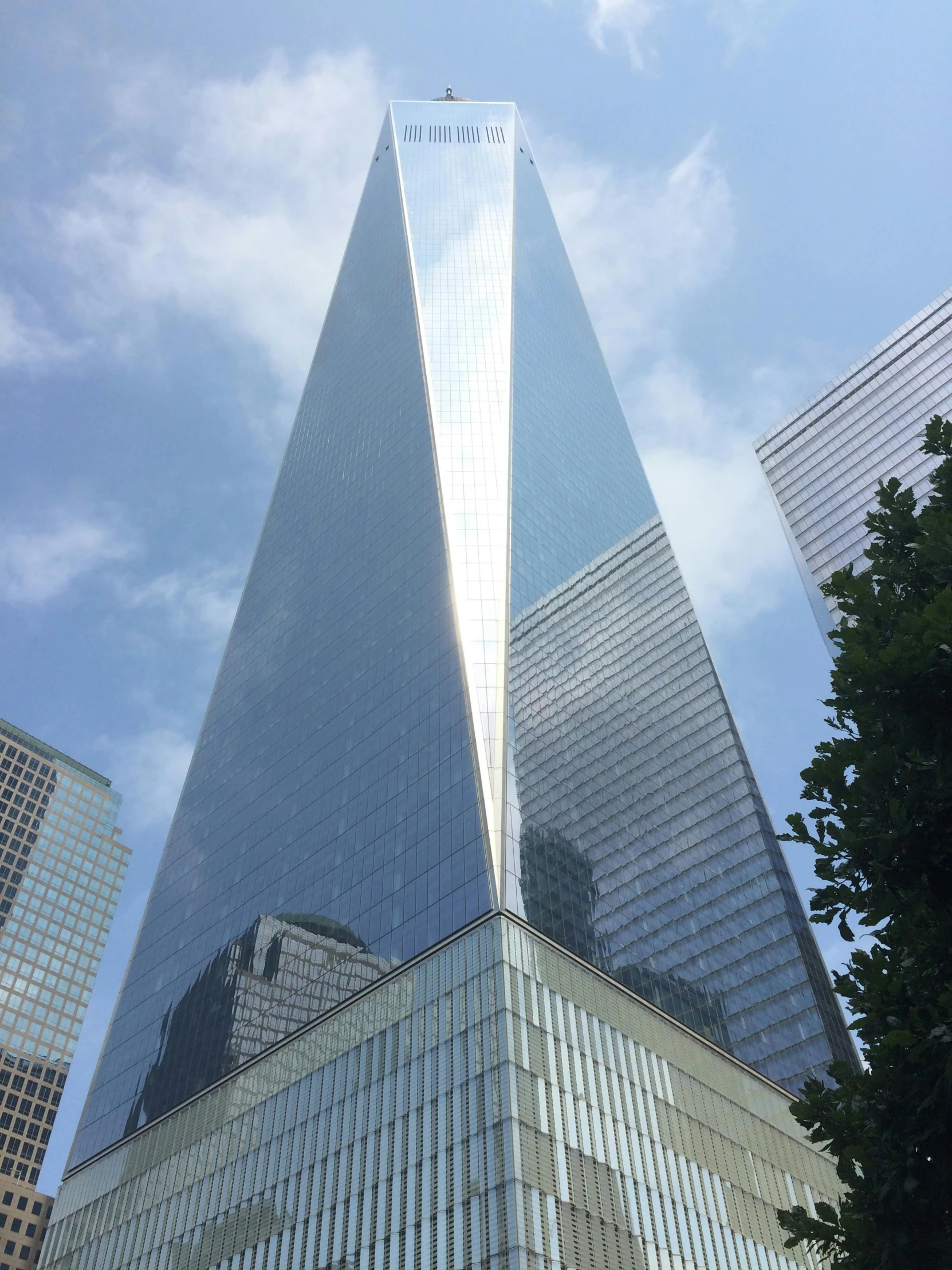 a very tall building with some windows and the sky in back