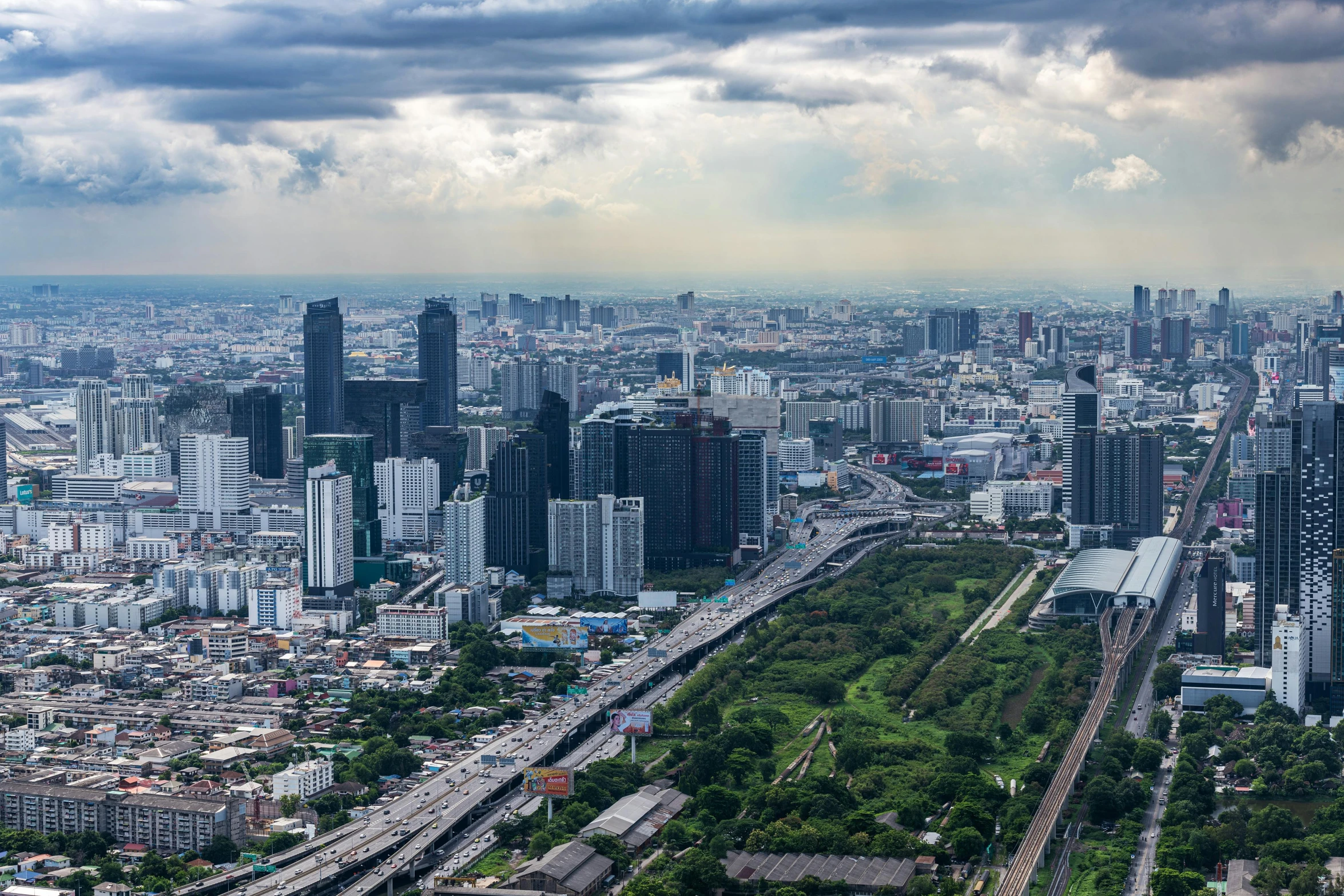 a cityscape with an aerial view of the sky