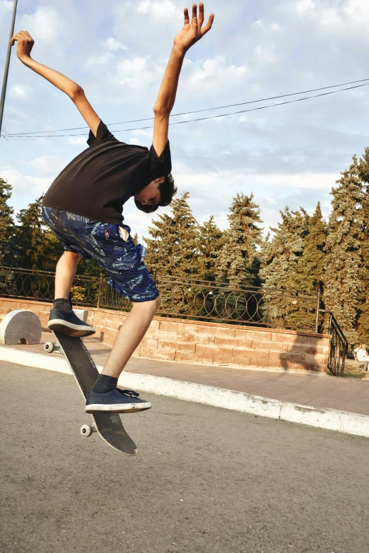 the skateboarder is getting ready to jump high in the air