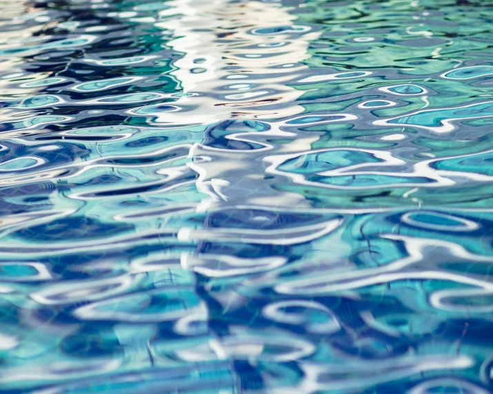 the surface of water with an intricate design