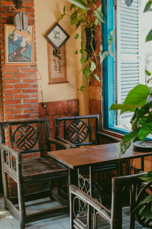 two wooden tables and chairs in a room