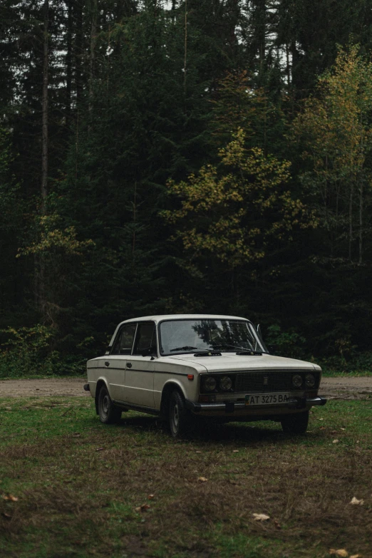 the car is parked on the side of the road