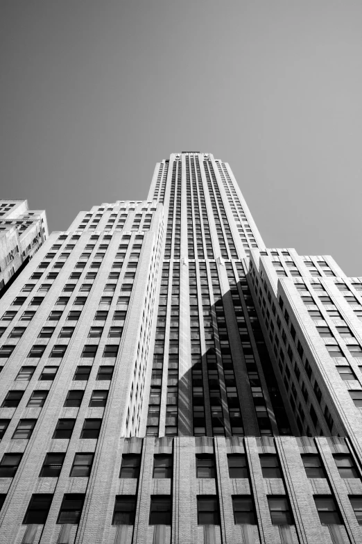 a view up at the top of a skyscr building