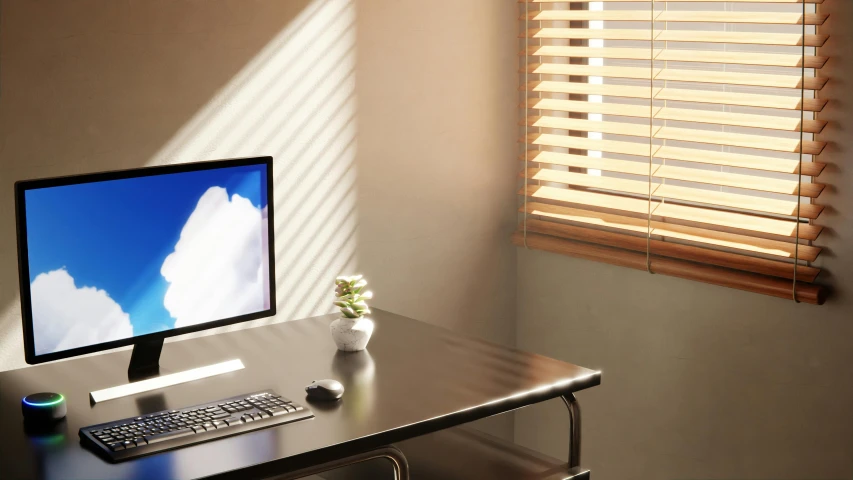 a computer monitor and keyboard on a desk in front of a window