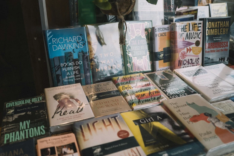 a display table full of books at a liry