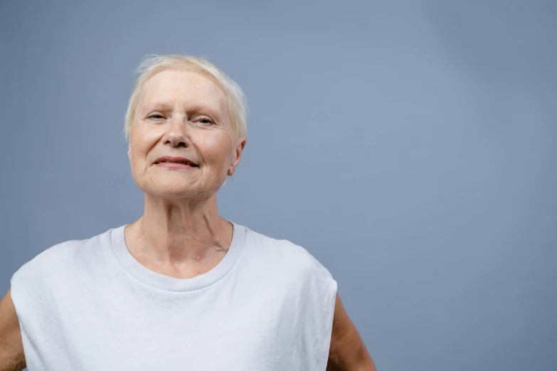 a very older woman looking up into the distance