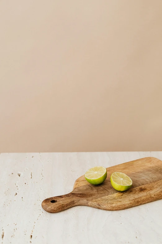 a wood  board with sliced apples on it