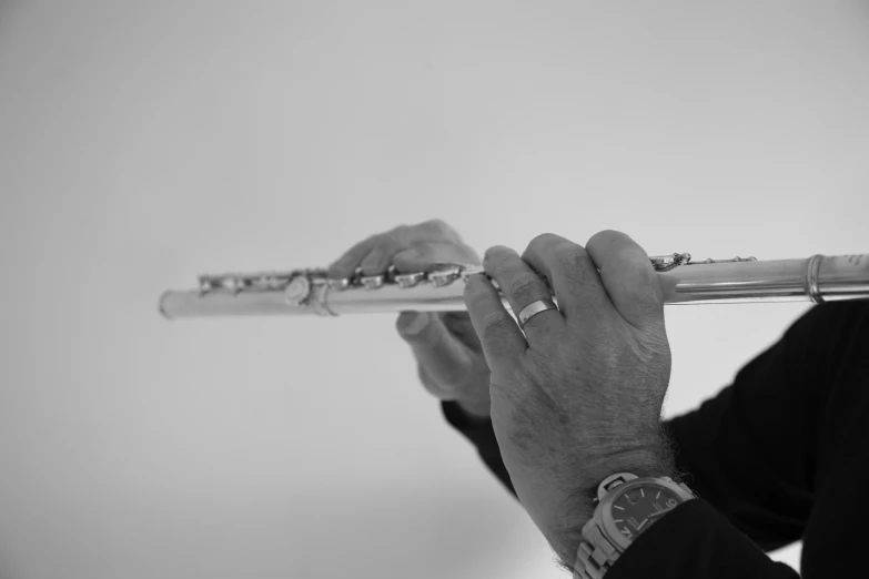 a person holding an instrument in their hands