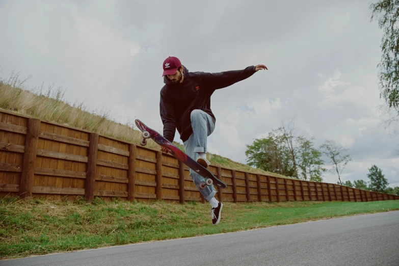 a man that is jumping with a skateboard