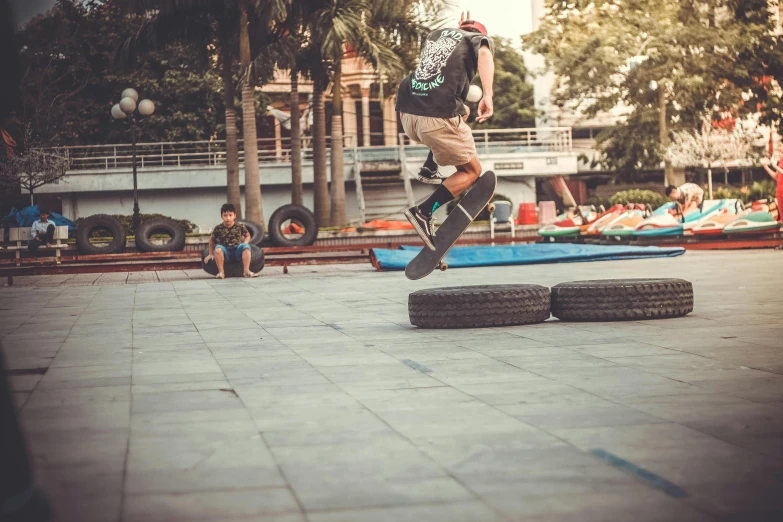 a skateboarder is doing a trick in a park